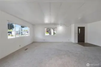 Front entry door is on the right -- opening to the large Living Room.