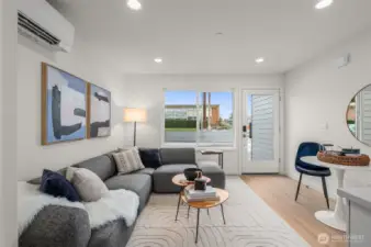 Step inside and feel right at home—this sunny living space perfectly blends modern simplicity and everyday comfort. Movie nights, morning coffee, or your latest read—this space has you covered.