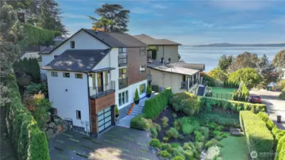 Striking Magnolia residence with sweeping Puget Sound and Olympic Mountain views.