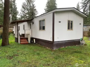 View of the side and back of the home.