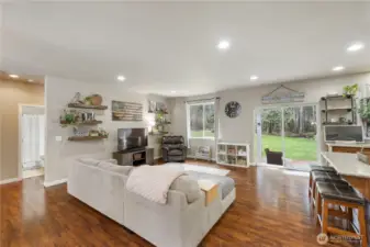 Light and bright family room with laminate flooring.