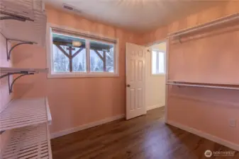 Downstairs primary walk in closet