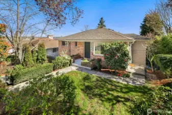 Only one step from the street and two entrances into the house (door off kitchen to the right). Such a charming setting!