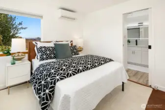 This bedroom is also connected to the shared main floor bath.