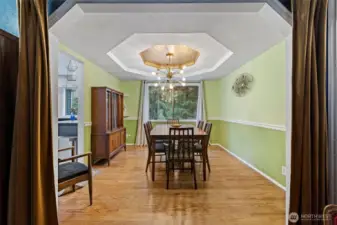 Formal dining room with awesome fixture.