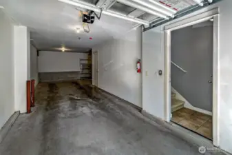 Huge 2 car tandem garage, plus door to access inside.