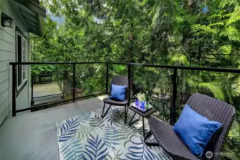 Spacious deck off living room from sliding doors; a great expansion of living space in the summer months.