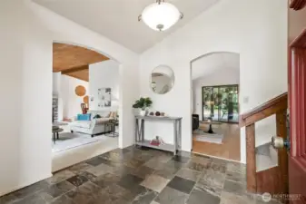 Beautiful and practical tiled entry with the living room to the left