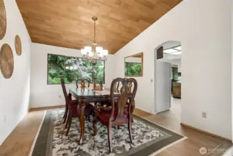 Large dining room with brand new LVP flooring is ready for your holiday gatherings!