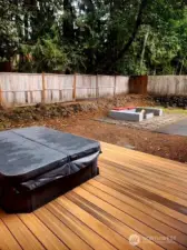 Hot tub and fire pit space-great place to entertain day or night!