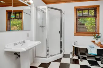 Large bathroom with separate shower and tub.