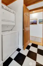 Washer and dryer are tucked away in the bathroom.