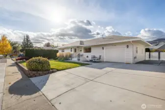 Newer concrete for all walkways, patios, steps, and widened driveway for additional parking