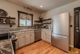 Updated appliances. Door leads to garage