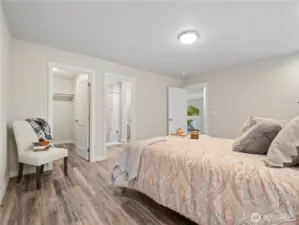 Roomy large bedroom on the top floor could serve as a second primary suite.