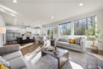 Open floor plan connects kitchen, nook and living area.