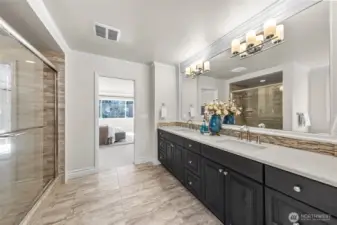 Primary bath adjacent to primary bedroom.