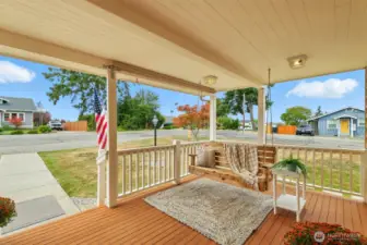 Large front porch with peekaboo views