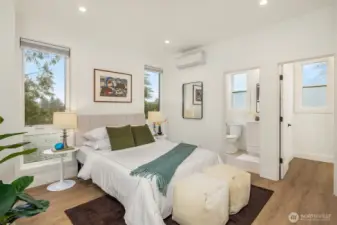 Your spacious primary bedroom, complete with walk-in closet and en-suite bathroom.