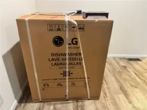 New LG dishwasher.  A wonderful open concept home, the kitchen flows into the living room. Notice the luxury vinyl plank flooring that's featured throughout the home.