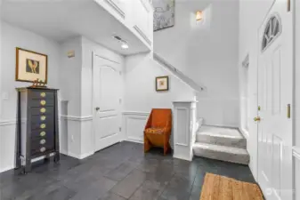 Welcome home to a large, inviting tiled foyer