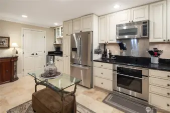 Large kitchen with SS appliances & induction cook-top.