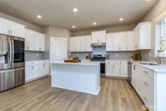 Soft-close cabinetry, corner pantry, center island