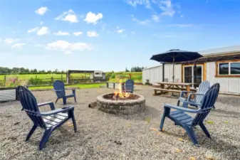 firepit area with adjacent entertainment barn