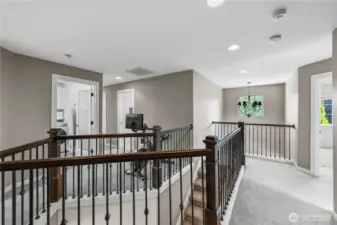 Open staircase helps upstairs feel bright and spacious