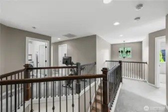 Open staircase helps upstairs feel bright and spacious