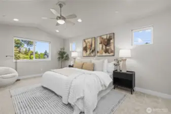 Primary suite with vaulted ceilings