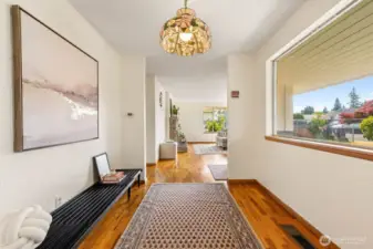 Large windows flood the living area with natural light.
