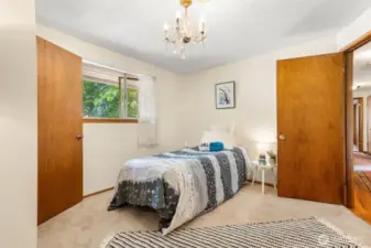 Spacious bedrooms with large windows and plenty of natural light.