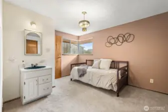 This bedroom features a toilet and vanity—ready to adapt to your needs.