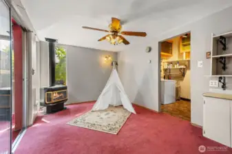 Cozy sitting room off the primary suite—perfect for reading, relaxing, or a nursery.