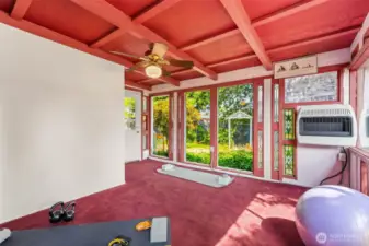 Bright and airy solarium offers year-round use and a propane heater.