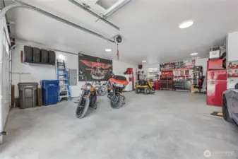 The garage is over 1,000 sqft, with ample storage for eveyrthing.