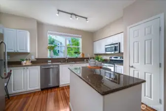 Pantry behind door on right