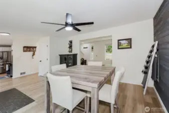Open concept dining room with updated finishes.