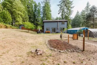 Additional exterior view of the home and lot.