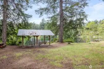 Outbuilding and open yard space.