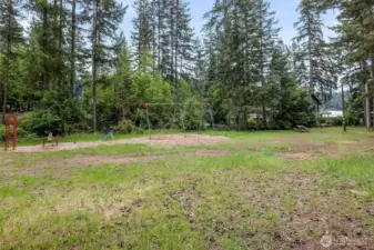 Expansive property with mature trees.