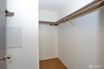 Walk-in closet in the primary suite.