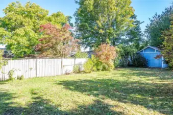 Generous backyard offering plenty of room for kids, pets, and fun outdoor activities.