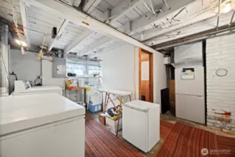 The laundry room is in the basement and has a laundry sink.