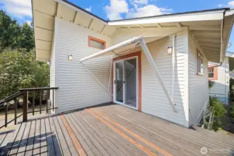 Looking at the rear of of the home with the easterly side yard.