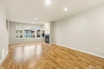 Great Room with gas fireplace and big windows for lots of daylight