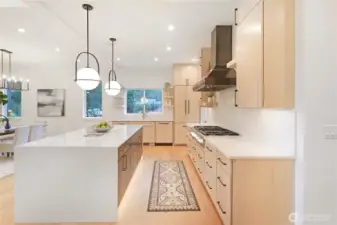 Refined kitchen cabinetry with seamless integrated appliances