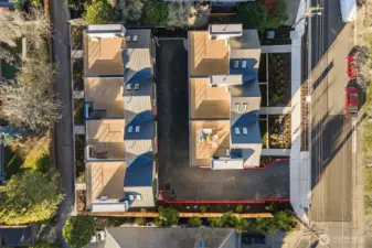 Private roof top decks with glass railings, Timbertech decking and exterior lighting