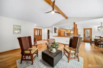 Living room towards kitchen and dining room.
